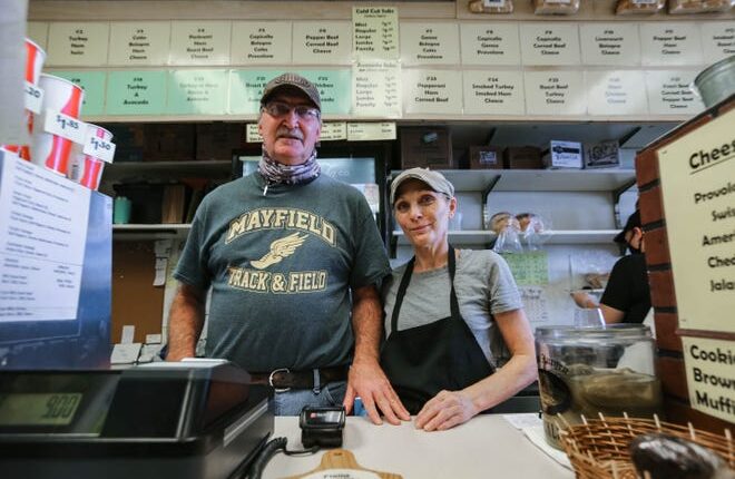 Corner Deli owners Mark and Cindy Stephens have owned the restaurant for 31 years.  They are pictured on August 31, 2021, the penultimate day of business.