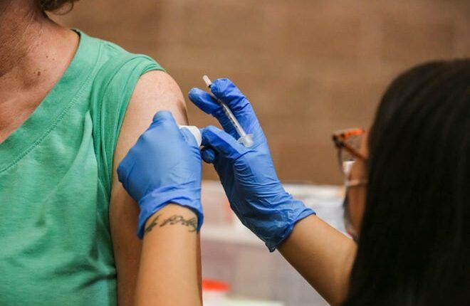Chris Ashpy will receive a vaccine on Tuesday, October 19, 2021 at a clinic offering COVID-19 vaccinations at the New Mexico Farm & Ranch Heritage Museum in Las Cruces.