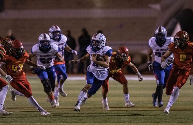 Dallas Boyd (2) plays the ball as the Las Cruces Bulldawgs battle the Centennial Hawks at the Field of Dreams in Las Cruces on Friday, November 12, 2021.