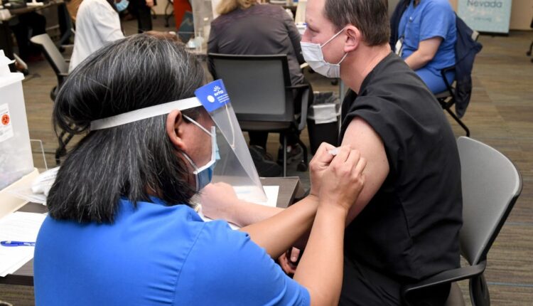 States forge ahead with COVID-19 booster shots for all adults