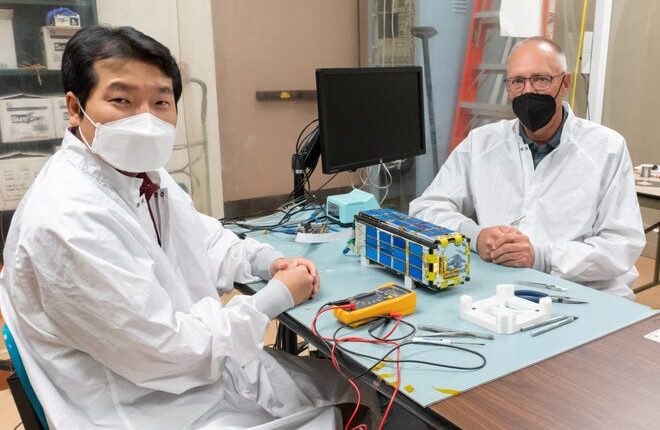 From left: Hyeongjun Park, Assistant Professor in the Faculty of Mechanical and Aerospace Engineering, and Steven Stochaj, Interim Head of Department of Electrical and Computer Engineering, lead a team of students in a Northrop Grumman-sponsored project to develop methodologies to support CubeSats with autonomous docking.