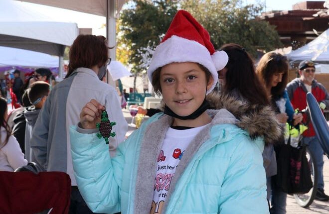 Layla Duga, 10, uses pony beads to make pearl animals as part of the Kids Can Youth Entrepreneur program.