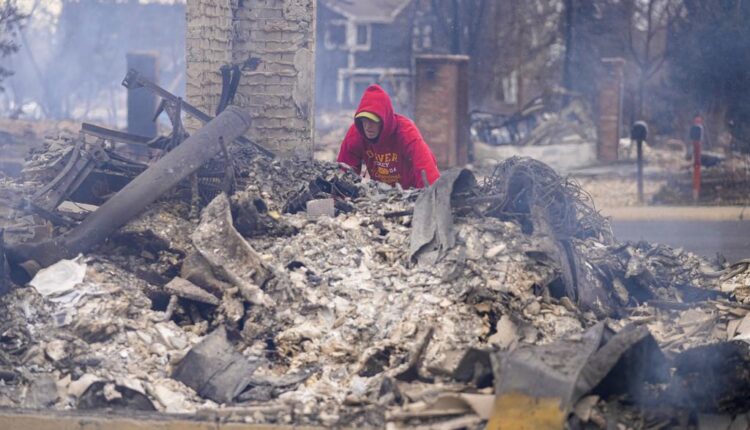 Officials: 2 missing in devastating Colorado forest fire

