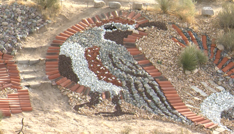 Colored rock and tile portrays a quail on the Tortugas Dam in southeast Las Cruces.