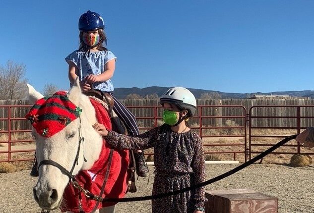 The horse-loving daughters of state Rep. Kristina Ortez, D-Taos, are Vida, 7, on the horse, and Gilly, 9.