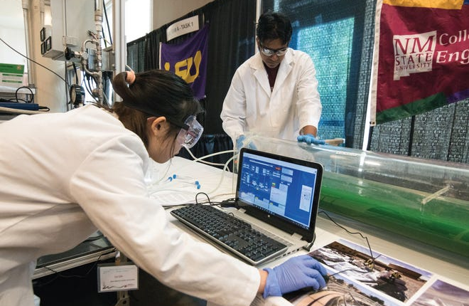 New Mexico State Engineering students evaluate their green computers in the WERC Environmental Design Contest.