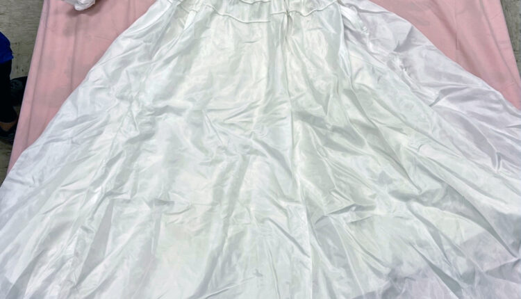 Wedding dress made from WWII silk parachute goes to NM museum
