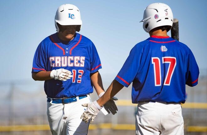 Cruces' Juan Perez and Ian Zepeda high-five during Las Cruces v.  Mayfield boys baseball game at the Field of Dreams on Friday, April 29, 2022. 