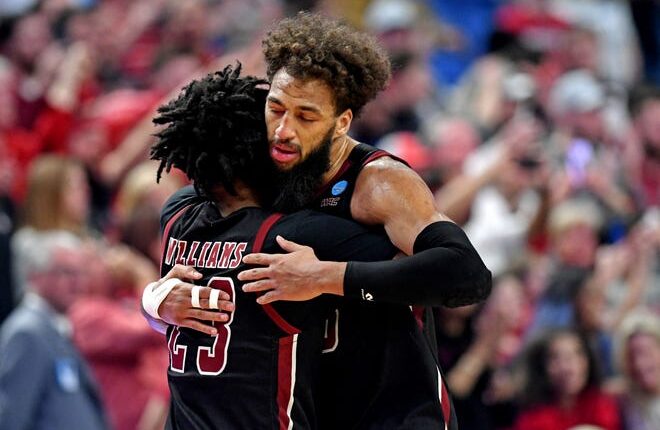 New Mexico State Aggies guard Levar Williams (23) reacts with forward Johnny McCants (35) during the second half against the Arkansas Razorbacks during the second round of the 2022 NCAA Tournament at KeyBank Center on Saturday, March 19, 2022 in Buffalo, NY Credit : Mark Konezny-USA TODAY Sports