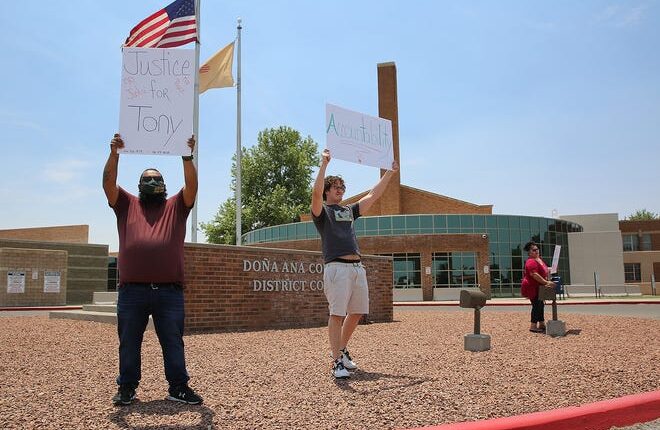 Protestors gathered near the 3rd Judicial District Court sign and near West Picacho Avenue on Wednesday, May 25, 2022, to call for an end to police brutality and justice for Antonio Valenzuela.