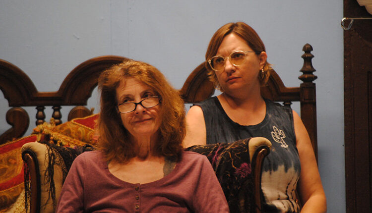 Deborah Storm, left, and Rachel Thomas-Chapel in a rehearsal of &ldquo;Three Tall Women&rdquo; at Las Cruces Community Theatre.