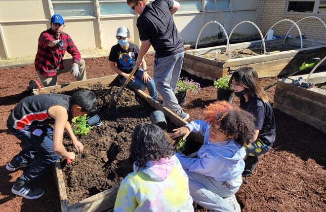 Students at Lynn Middle School tie in and wrap up their vermicomposting with community partners, Dr.  Emily Creegan and Abby Nayra, by beautifying their school gardens where they can incorporate their freshly produced compost.