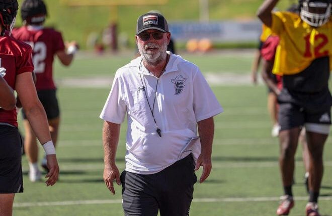 New Mexico State football coach Jerry Kill runs football practice at Aggie Memorial Stadium.