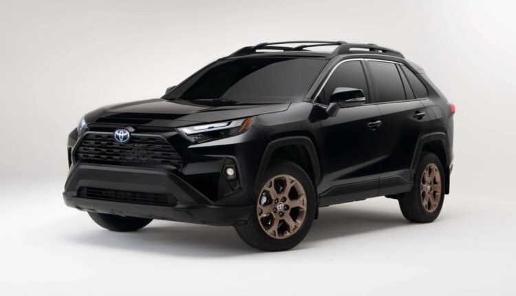 Front angle view of Midnight Black Metallic 2023 Toyota RAV4 crossover SUV