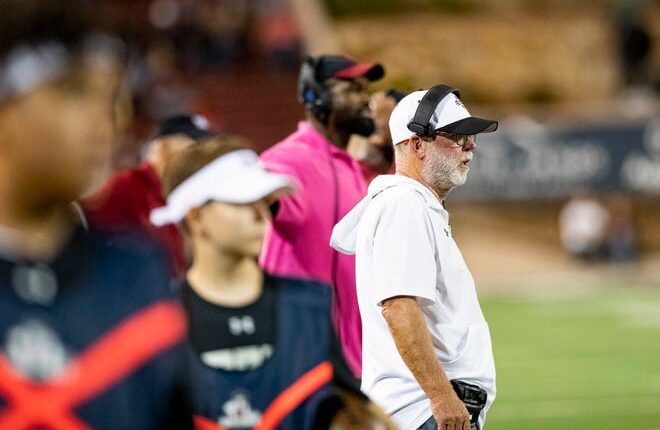 NMSU head coach Jerry Kills watches his players during the New Mexico State University game on Saturday, Aug. 27, 2022, at the Aggie Memorial Stadium. 