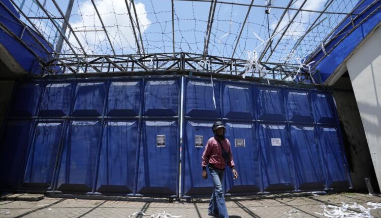 Indonesia police: Stadium exit gates too small for escape

