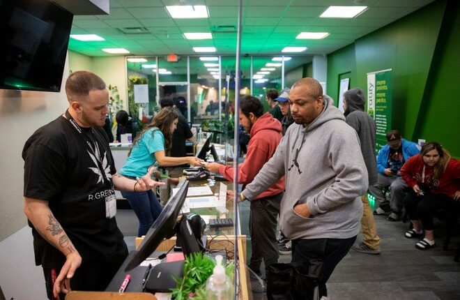 US Army Vet Jamar Wilson buys THC products from the R. Greenleaf dispensary in Las Cruces, Friday, April 1, 2022. On April 1, the Land of Enchantment became the 18th state to regulate retail cannabis, and several stores in Las Cruces celebrated the historical date by opening their doors at 12:01 am