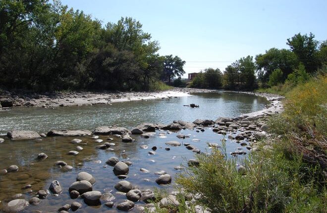 The Animas River flows adjacent to Berg Park in Farmington on Sept. 10. San Juan County has not seen as much moisture this summer as other parts of New Mexico, but its precipitation over a three-month period has been nearly average -- a marked improvement from the past several years.