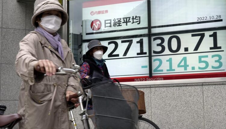 World shares lower, led by 3.7% drop in Hong Kong
