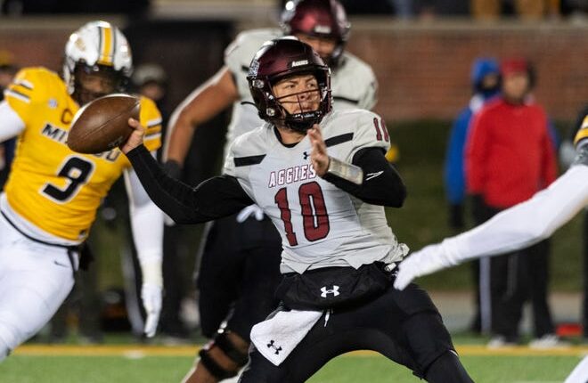 New Mexico State quarterback Diego Pavia throws a pass during the first quarterer of the team's NCAA college football game against Missouri on Saturday, Nov. 19, 2022 in Columbia, Mo. (AP Photo/LG Patterson)