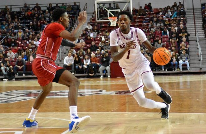 New Mexico State's Marchelus Avery takes the ball down the lane as the Aggies took on Southern Utah on Wednesday night at the Pan American Center.