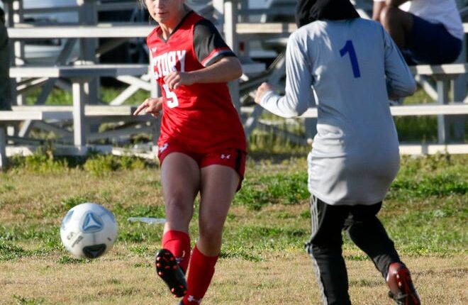 Victory Christian's Abby Tattrie sends the ball up the field against Universal on Thursday afternoon in the Class 2A, District girls soccer tournament.