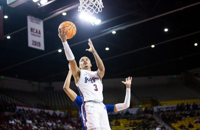 NMSU guard Xavier Pinson shoots a basket during a mens college basketball game on Saturday, Jan. 14, 2023, at the Pan American Center. 