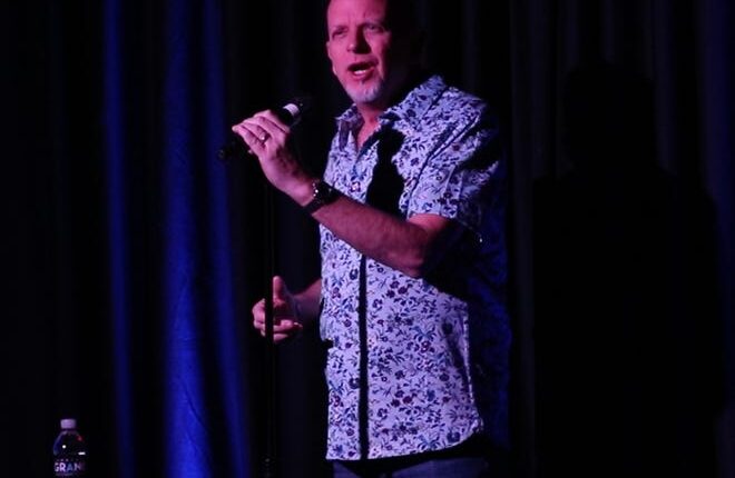 Don Barnhart, owner of Jokesters and Delirious comedy clubs, on stage in Las Vegas.