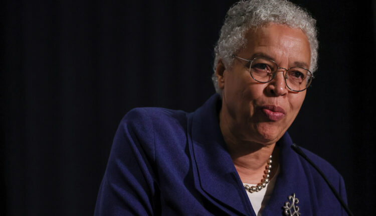 A photo of Toni Preckwinkle speaking at an event.
