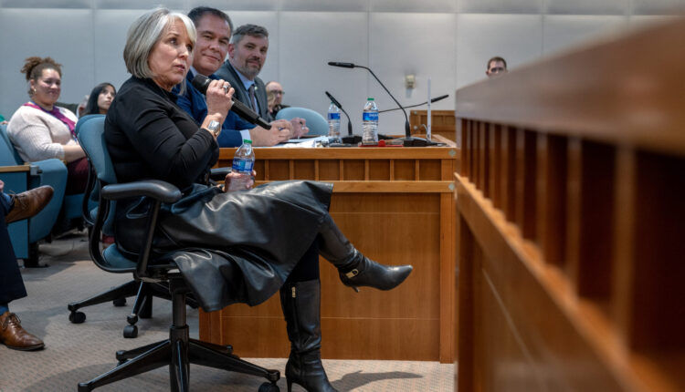 Governor tries to save proposed Housing Office by making rare appearance at committee meeting