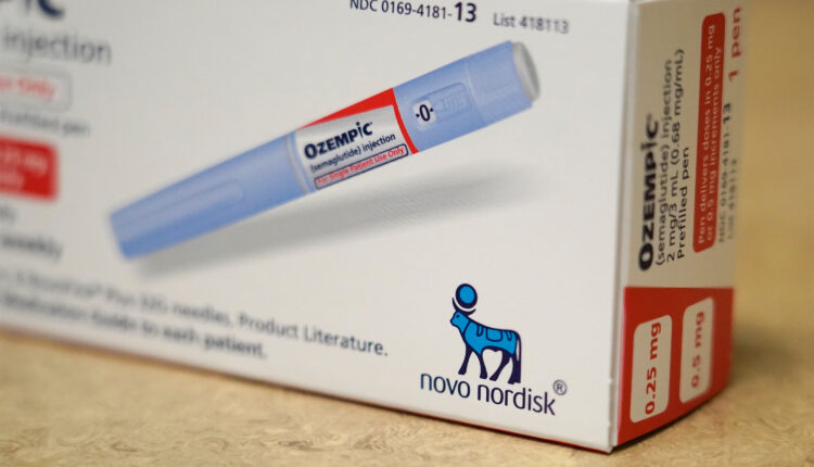 A photo of a box of Ozempic at an angle, showing the Novo Nordisk logo.