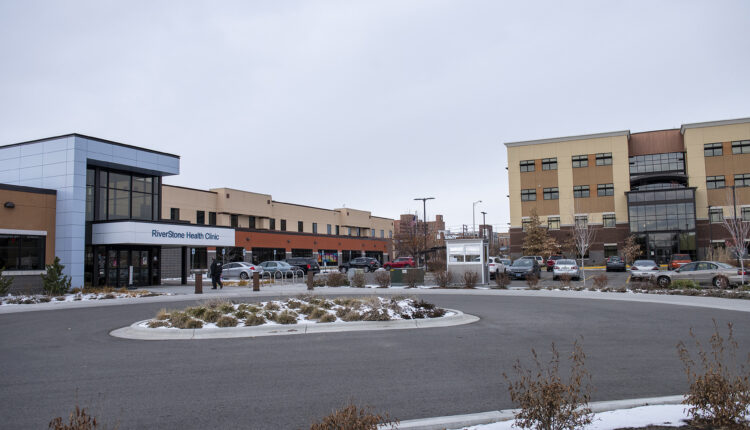 An exterior of a clinic building from the parking lot.